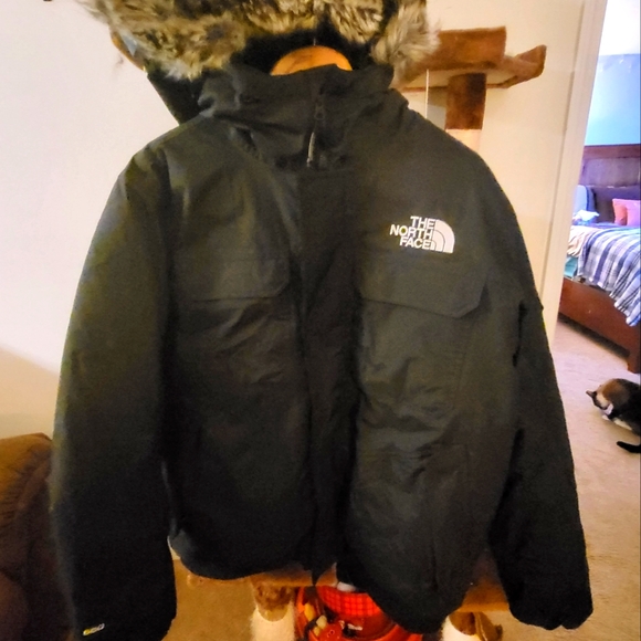 The North Face 100% Guaranteed real. Never worn Coat.